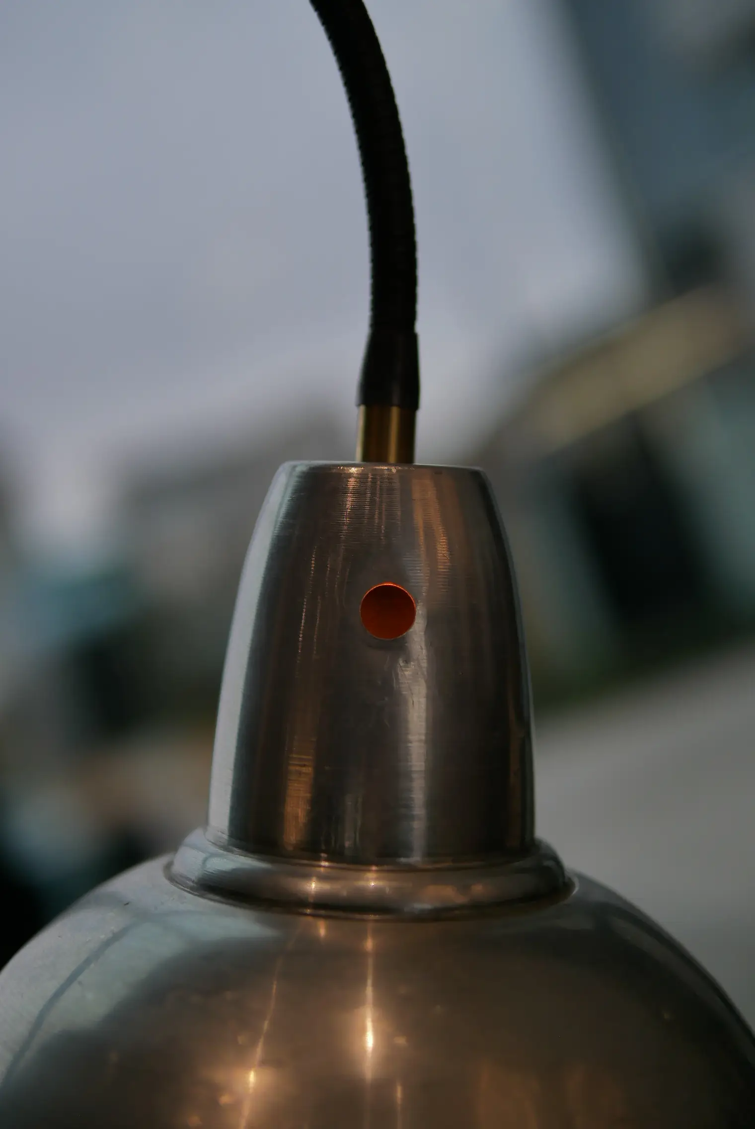 Detail - the joint, the lampshade, the base