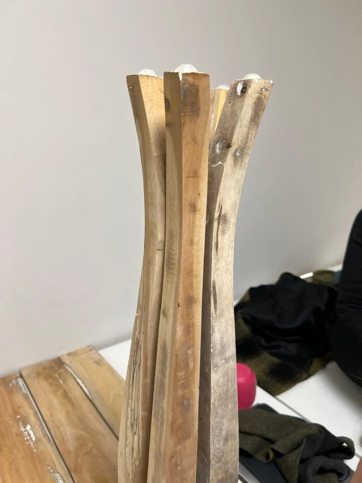 Salvaged curved timber, a bored four-centimetre section against a ruler, the 3D-printed base seating the stem, and assembly