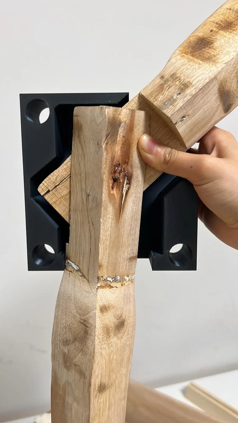 The standing-lamp elevation and joint studies in pen, the joint marked out, a 3D-printed connector gripping the salvaged timber, and the printed iterations